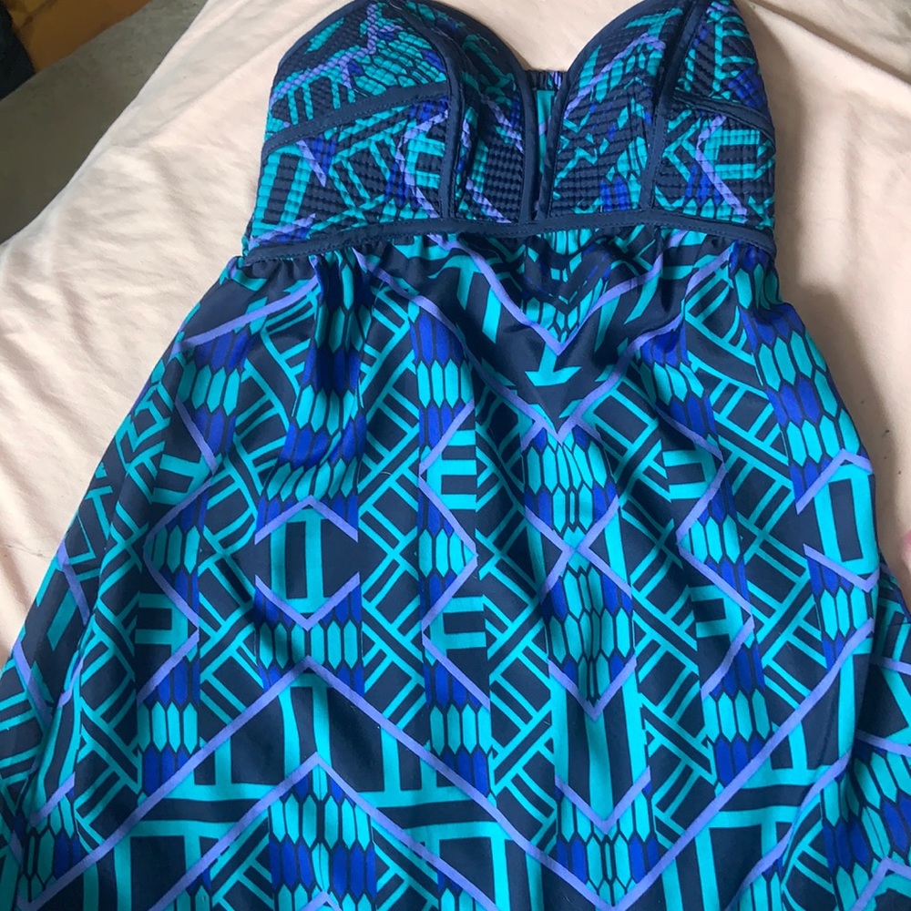 This dress is by Xhilaration and is a mix of blues